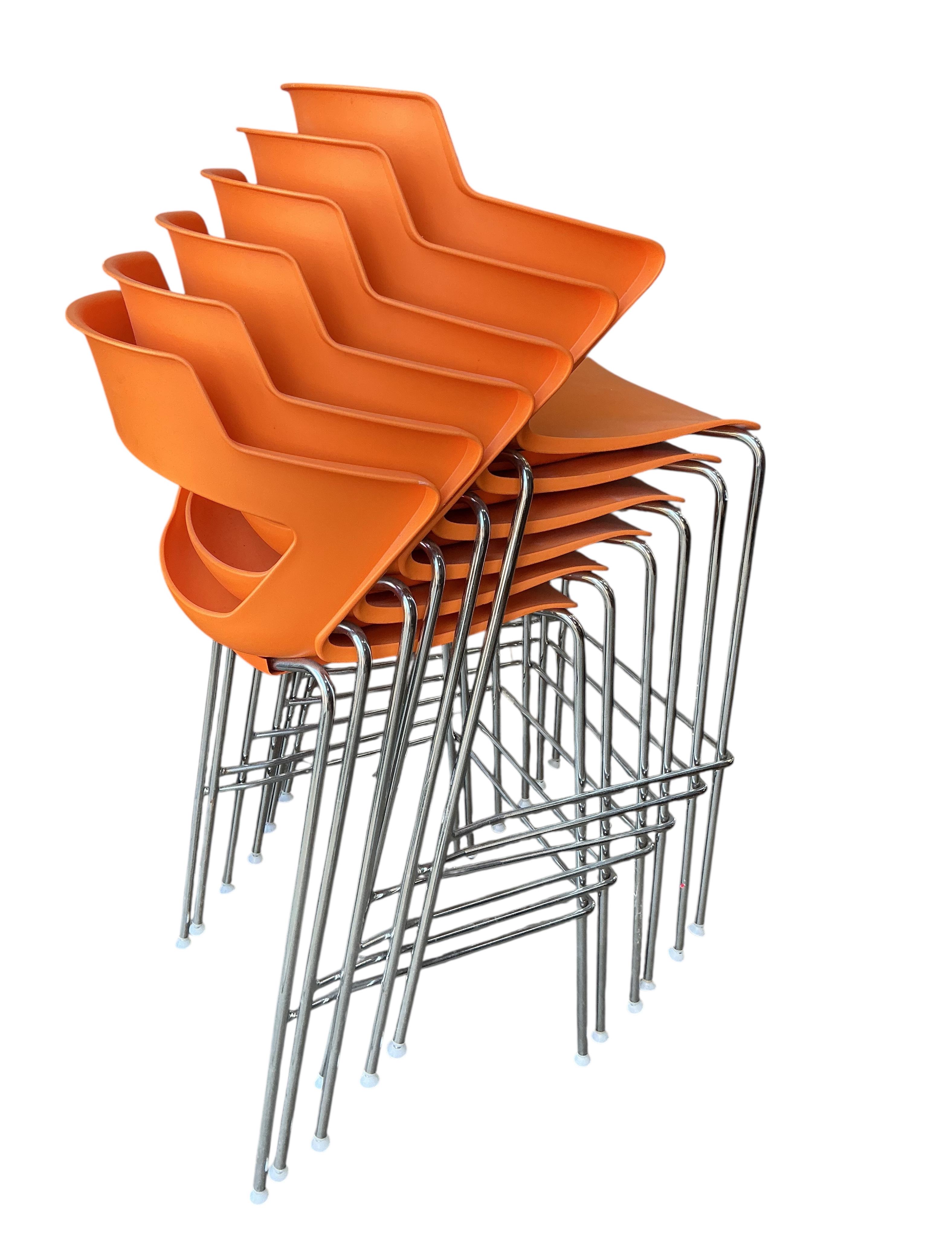 Paolo Lucidi and Luce Pevere for Elite, a set of six orange stackable bar stools, width 54cm, depth 46cm, height 109cm